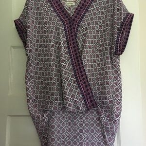 Hi-low blouse with open front, tacked at neck and hem.